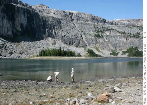 Testing the water temperature of Rockbound Lake