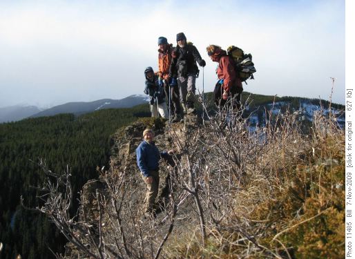Ramblers on a rocky outcrop on the edge of Coal Creek