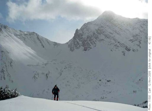 Climbing to our high spot (Grizzly Col,Mt Tyrwhitt and it's window in background)