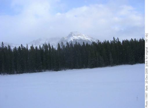 A patch of blue showed the mountains