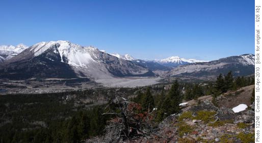 Looking West from the Ridge towards Turtle Mountain (2,210m), Coleman is visible through the gap, with Mt Tecumseh (2,549m) beyond.
