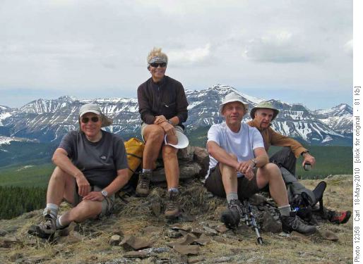 Peter, Alda, Carl & Damian at our high point (Volcano Ridge), Bluerock Mtn in background