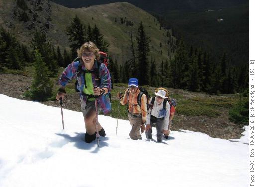 Jean, Waheed & Arnold climbing a snowdrift