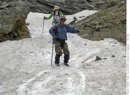 Peter and Becky glissading below Tiara Peak