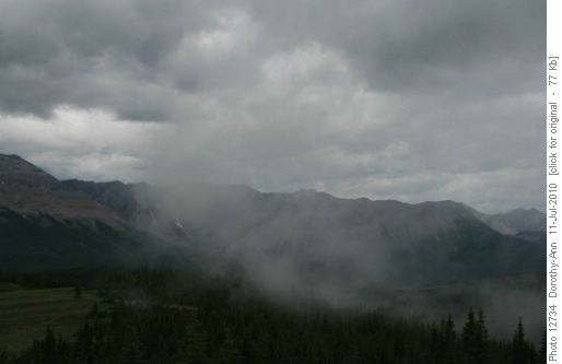 Mists kept swirling up the valleys to the ridges