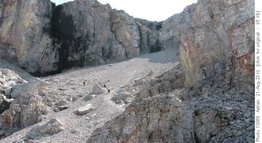 Crowsnest Mtn: Descent of scree bowl immediately below crux gully
