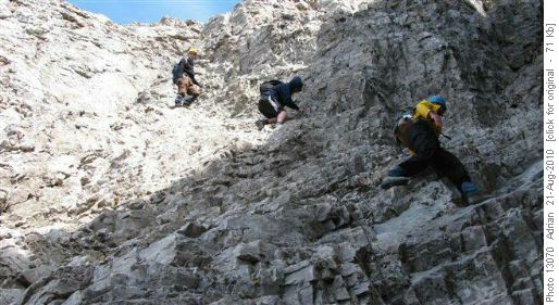 Crowsnest Mtn Crux descent with chain secured by 3 bolts