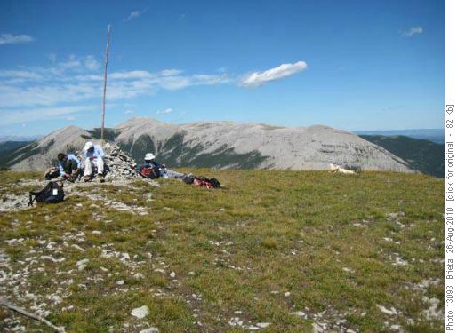 Sprawled out on the summit with Moose Mtn. in the background.
