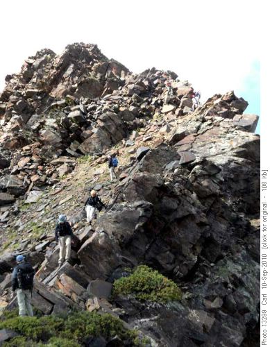 Descending the summit ridge of Dromedary Peak