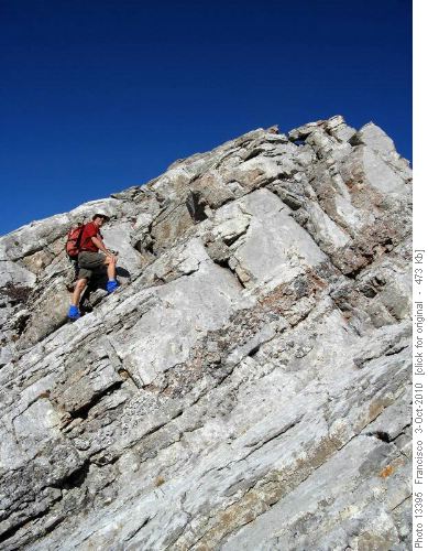 Ron scrambles up Nihahi's #3 summit