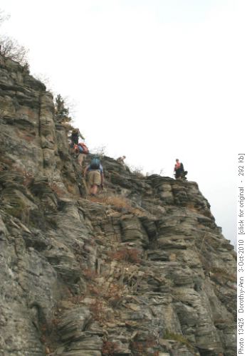 Climbing the rock band to Green Mtn