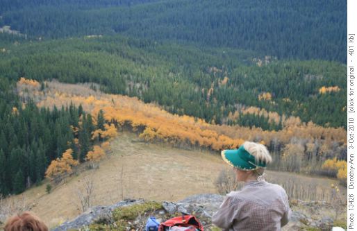 Marianne enjoys lunch and a view of the colourful valley