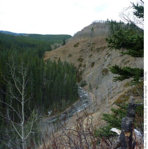 Trail through open meadows to top of ridge