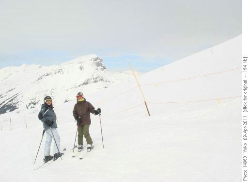 Carl and Yoko at Sunshine village, Mt. Bourgeau background