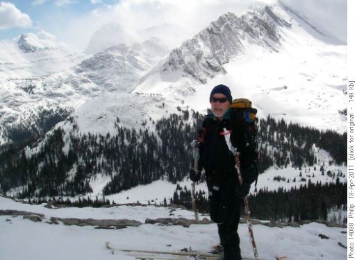 Unnamed skier with rustic poles