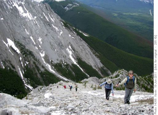 Ramblers in a long line to the summit