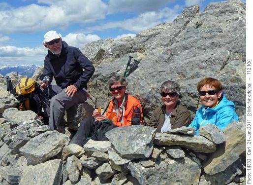 Arnold, Pat, Nancy and Kathy in a wind break on Ha Ling