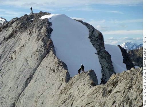 Susan and Alda on the summit ridge to Lady Mac (third party at summit)