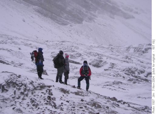 The group assesses their route options in the Sparrowhawk cirque. The group assesses their route options in the Sparrowhawk cirque.