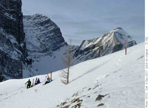 Lunch break at the col between Mt Smith-Dorrien and Hero Knob (Mt Murray at right)