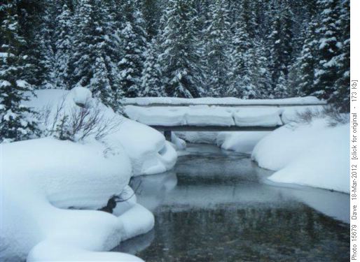Currie Creek bridge with snow up to the handrail