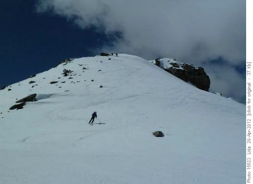 {1365 Kev Sta} skiing down Unity peak.