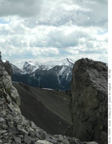 Tiara Peak through a slot in the ridge