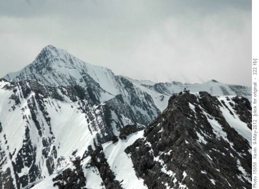 Ramblers on the summit - taken from the second summit of Wasootch Peak