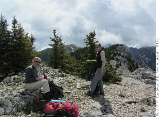 Sunny break at the top of the main climb: {1456 Clifton Potter} & {223 Rita Polt}