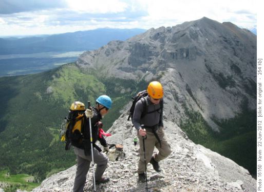 Clifton and Arnold on the summit ridge with Yam in the background