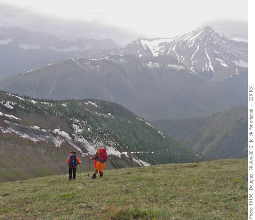 Descent from 2nd hilltop with Mist Mountain in the mist