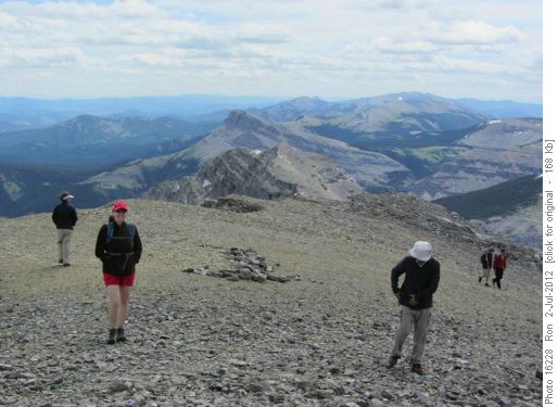 On top of Burke looking southeast, {1564 Teresa Leszczynska} (in red) & {362 Mo Alviri} (white hat)