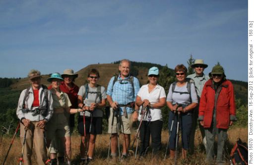 Our very cheerful group with Mesa Butte behind
