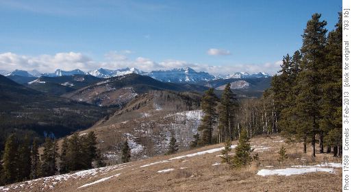 View from Sandy McNabb, across the low Mt MacNabb above the Sheep River Valley to Bluerock Mt.