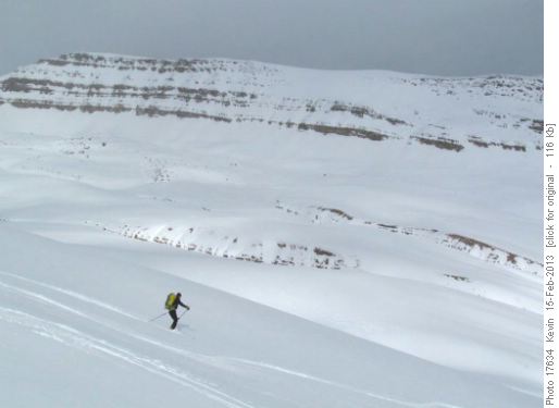 Arnold making turns down untracked powder