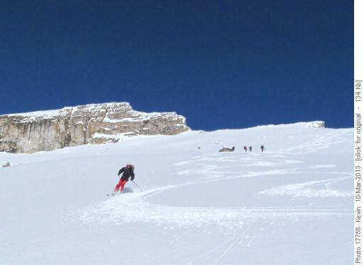 Norm making turns on our first run down from the col