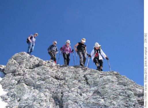 Starting back down the rock rib below the summit