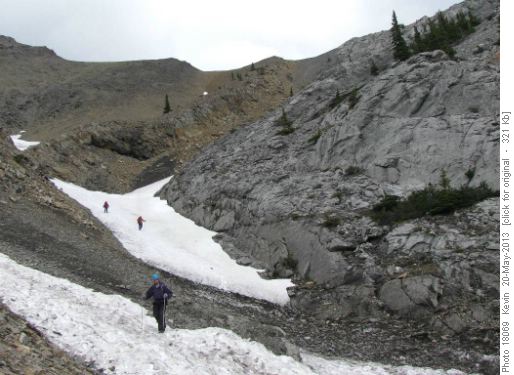 Dave crossing the snow in the middle section of the descent gully