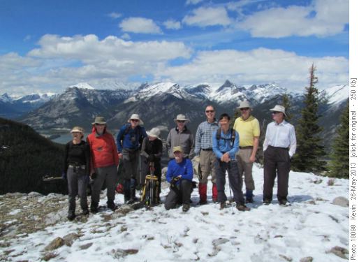 Jeannine (behaving herself!), John, Manfred, Jeannette, Kevin, Damian, Norman, Chau, Ron and David at a rest stop on the eastern leg of the Heart Mountain loop Jeannine (behaving herself!), John, Manfred, Jeannette, Kevin, Damian, Norman, Chau, Ron and David at a rest stop on the eastern leg of the Heart Mountain loop