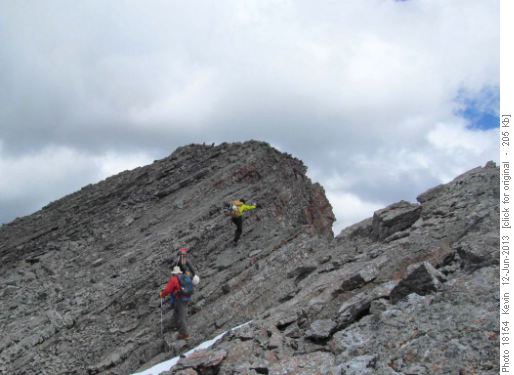 Last few steps to the summit of Ships Prow peak