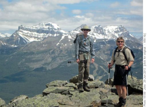 {140 Nor Acq} and {413 Gar Luz} on the summit Saddle Peak looking N towards the ski area, Mount Richardson, Pika Peak and Ptarmigan peak