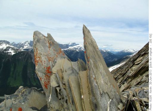 Slabs on the upper ridge framing the Goodsirs