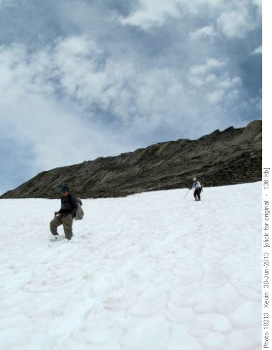 Heading down the snow on the upper slopes of Vermilion Peak