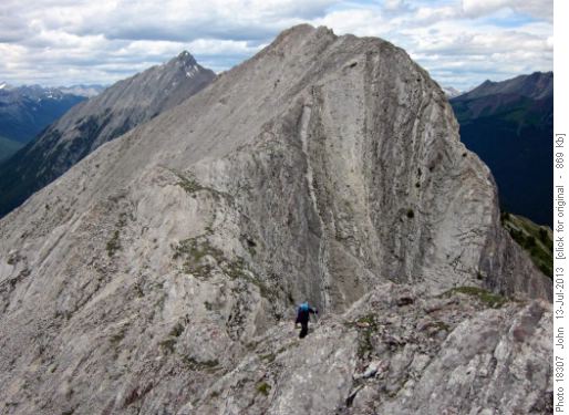 Looking back to the summit Mount Norquay during a descent of the south ridge