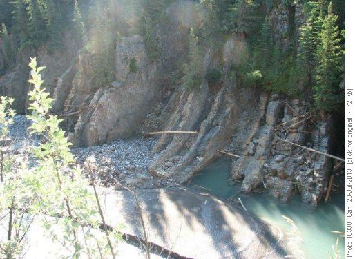 Huge logs jammed 30 feet up canyon walls