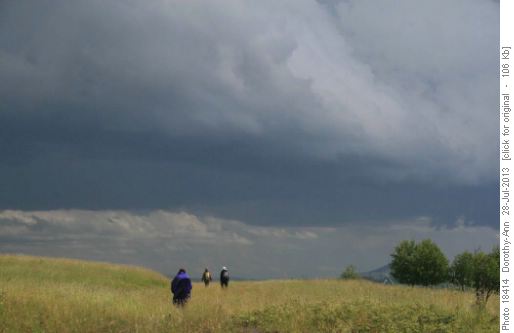 Along the road back to the start. In the sun but with storms to the south