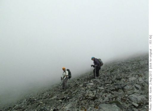 Descending from the ridge in a cloud mist