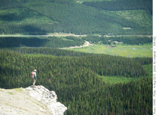 Norman surverying ski slopes and Engadine Lodge