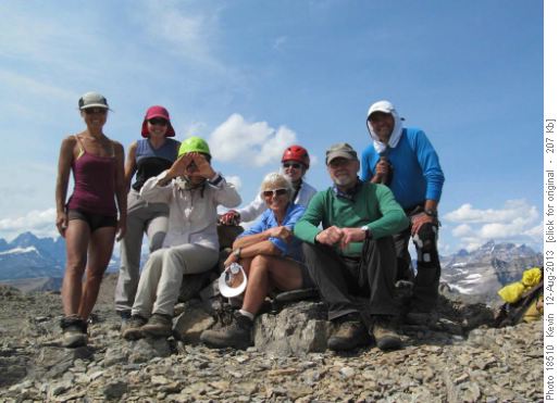 Strange lady in green helmut in Whymper summit photo