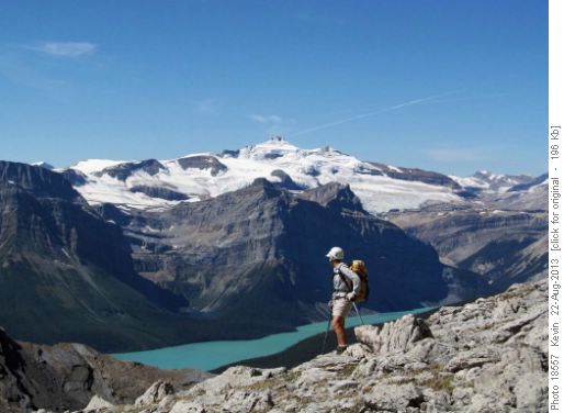 Alda on the shoulder of the Unnamed Peak with Mt Balfour in the distance